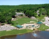 Aerial view of pool and lake.