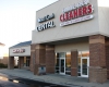 The dental practice is located in a traditional commercial and retail shopping center