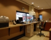 The teller's area is designed for functionality and efficiency