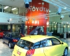 The showroom design showcases the vehicles and the Toyota brand equally